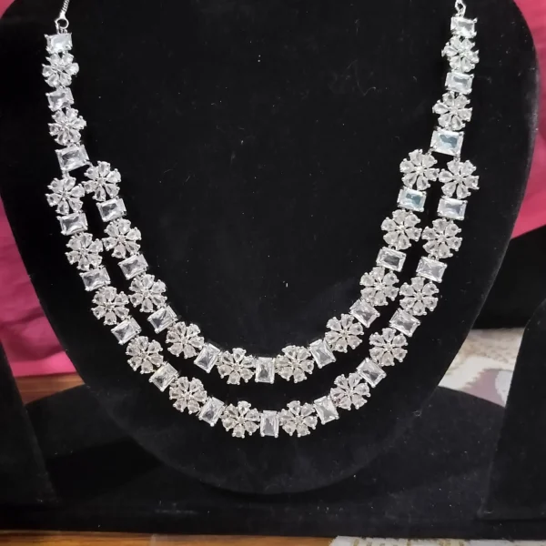 Rhodium Plated Silver Toned White American Diamond Studded Necklace With Earring Jewellery Set For Woment and Girl Best Suits for Party, Wedding and Festive Occasions - Image 4